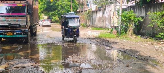 Roads in the industrial area are collapsing, drains and sewers are lost in mud.