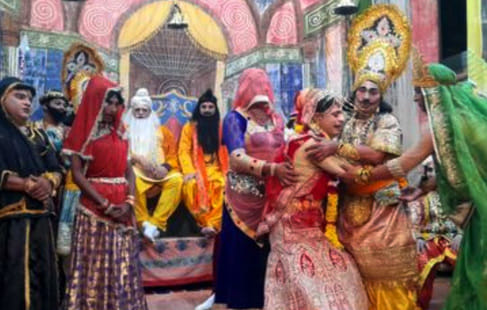 Rama broke the bow, Sita put the garland on him.