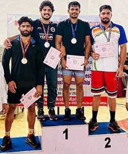 The district got 16 medals in the Railway Wrestling Championship.