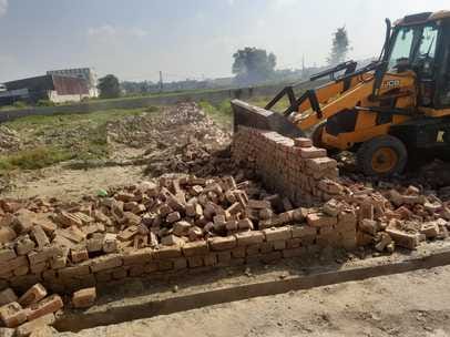 DTP's bulldozer runs on three illegal colonies