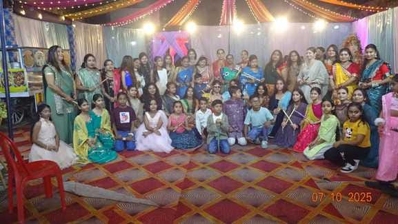 Women and children added colour to the Dandiya Night