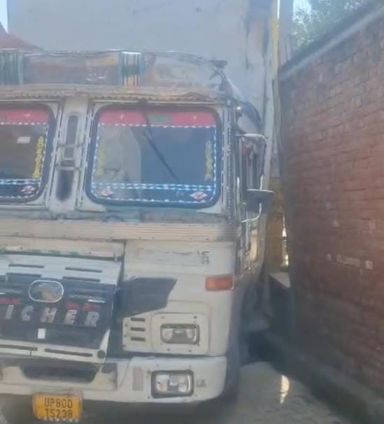 A drunk man drove a truck loaded with chocolates into a village street.