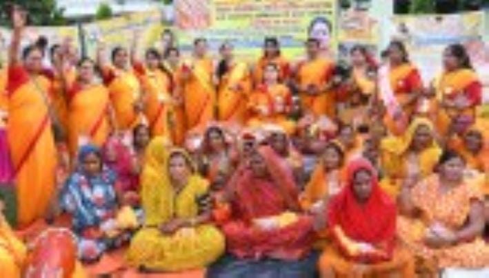 Distributed Sanatan sarees and earthen lamps