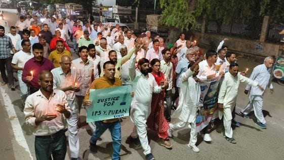 District Congress Committee and all the communities took out a candle march.