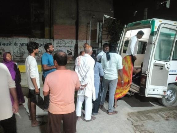 A woman returning home in an auto-rickshaw was crushed by a pickup truck and died.