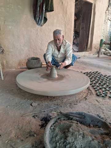 On the dancing wheel, potters are forging hope for light
