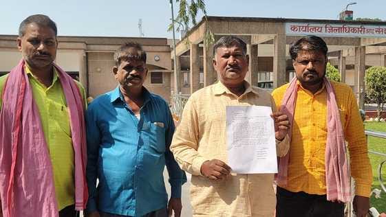 Accused of building two madrasas and a settlement on government land