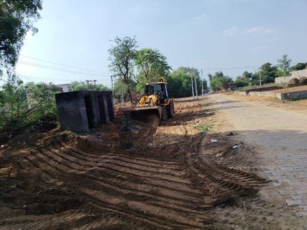 The narrow road became 44 feet wide as soon as the encroachment was removed.