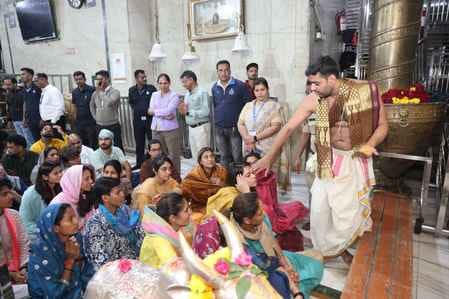The Indian women's cricket team sought Mahakal's blessings to win ICC World Cup and followed temple rules.