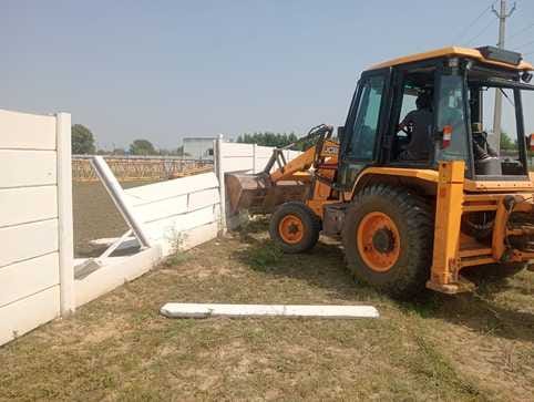 Demolishing illegally developed constructions in the colony