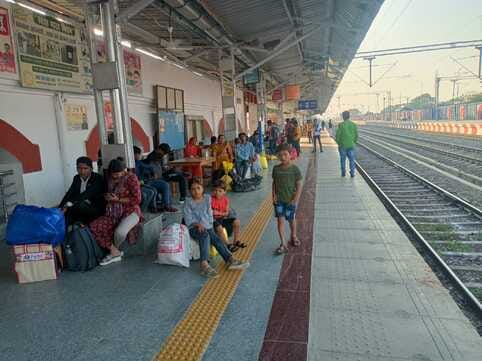 I want to celebrate the festival with my family, but I am feeling sad while travelling by train.