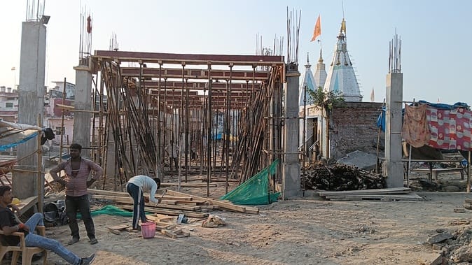 Preparations begin to put a roof on the circumambulation path of the Shiva temple corridor