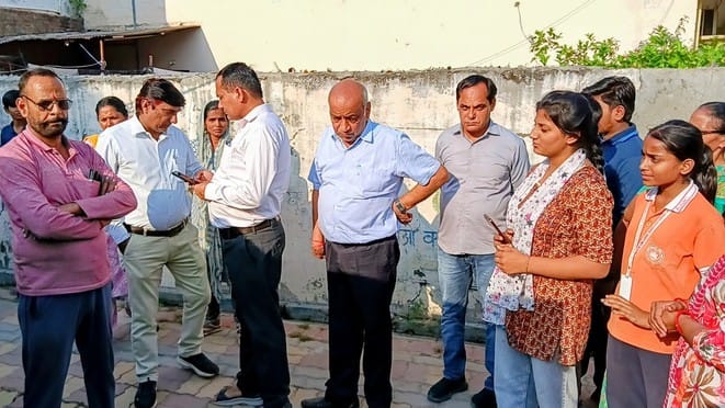 The team investigated the matter of blocking the road by building a wall.