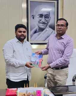 Book presented to DM