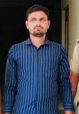 A man wanted in a murder case with a reward of Rs 10,000 was arrested.
