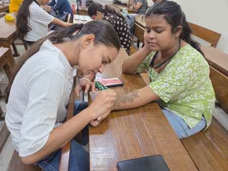Raman first in Mehndi design competition