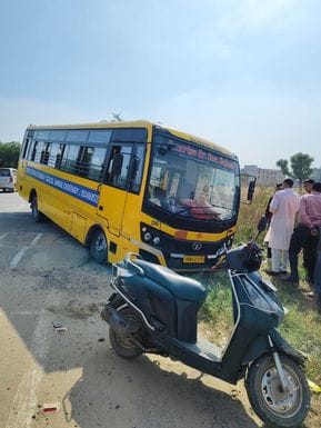 School bus falls into ditch while trying to save bike