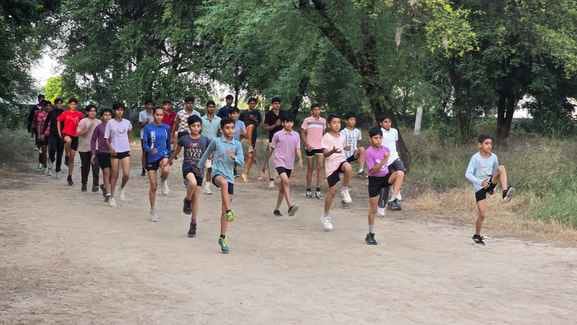 In the absence of a sports complex in Parata, players are forced to practice on Panchayat land.