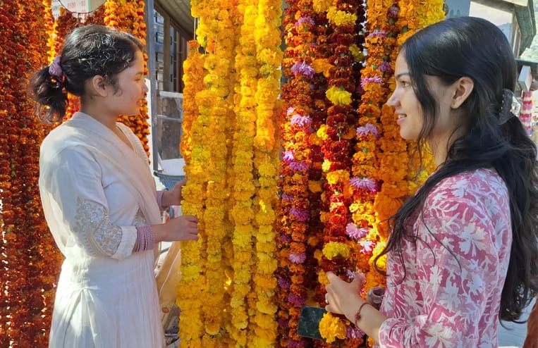 The fragrance of flowers fills the markets of Kullu.