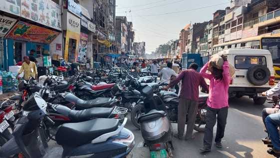 The highway was converted into a parking lot, making walking even difficult.