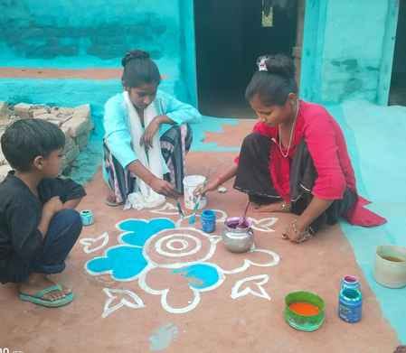 Girls decorated Rangoli outside their houses and welcomed Diwali.