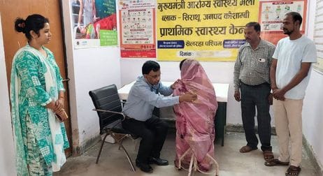 Crowd of patients suffering from viral fever, cough and cold at Arogya Mela
