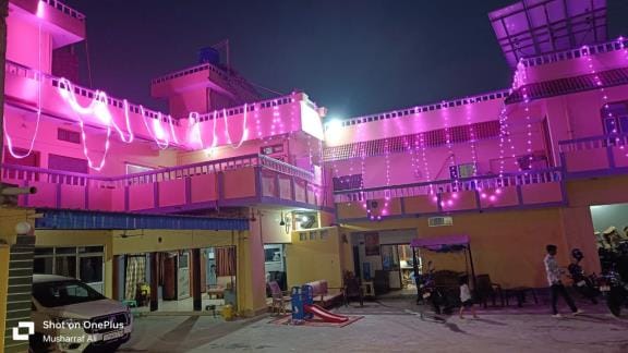 The city is illuminated with colorful lights