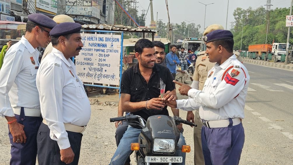 Those wearing helmets were given roses and sweets.