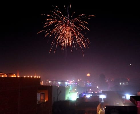 The earth was illuminated with lamps, the sky was filled with fireworks.