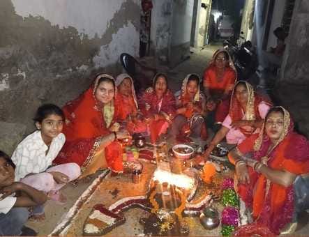 Women worshipped Govardhan made from cow dung.