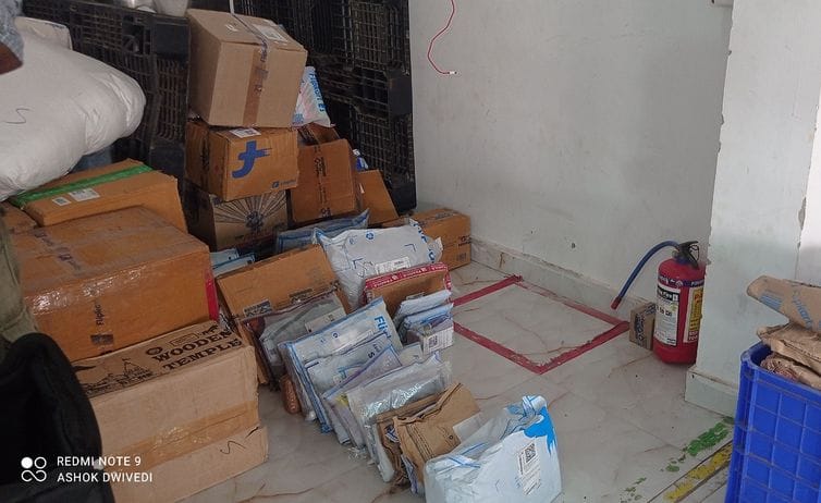 Thieves stole cash from the courier company's warehouse.