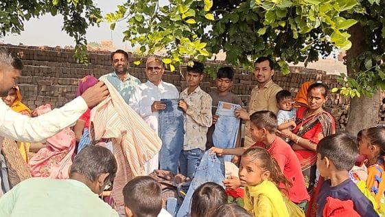 Went to brick kilns and distributed clothes to the needy