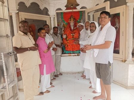 Worshiping Vishwakarma and praying for happiness, prosperity and progress in business