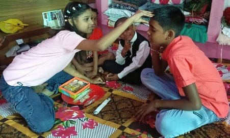 On Bhai Dooj, apply tilak to brothers and pray for their long life.