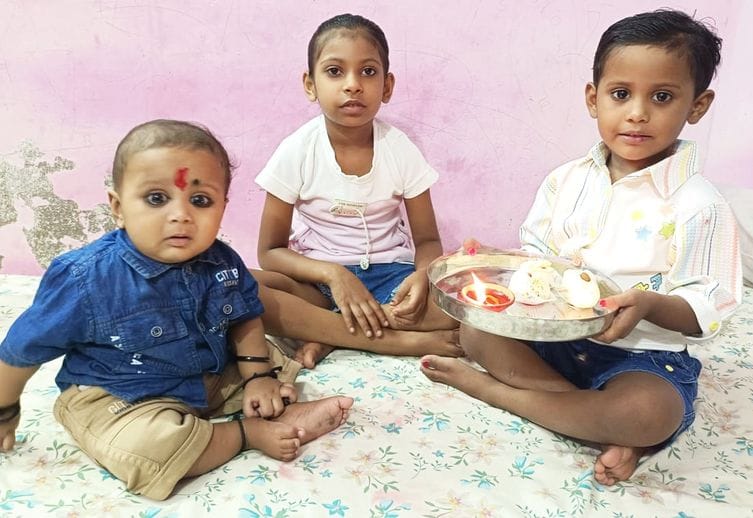 Sisters applied kumkum tilak on their brother's forehead