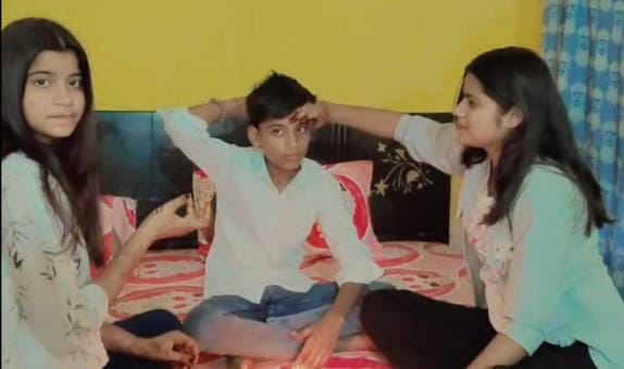 Sisters applied Tilak to their brothers, colours of relationships adorned with gifts