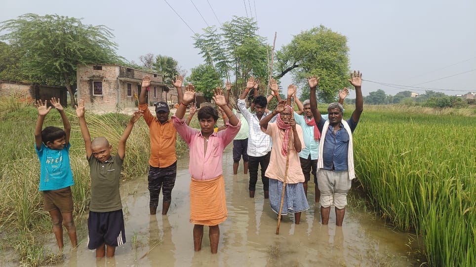 Villagers protested against waterlogging on the Chak Road.