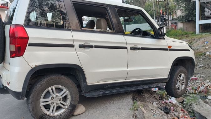 The vehicle went out of control at a sharp turn, passengers narrowly escaped.