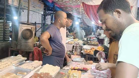 Shopkeepers set up tents and decorated sweets, there will be a crowd today