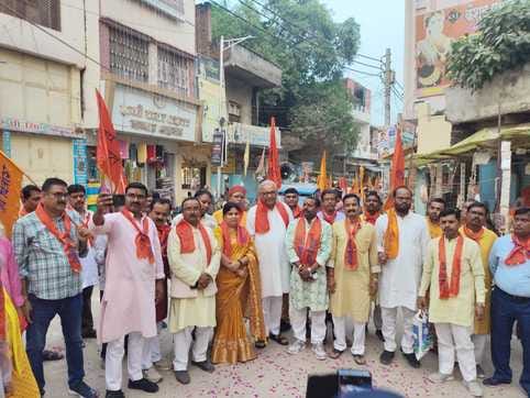Lord Chitragupta's procession was taken out with flags and banners.