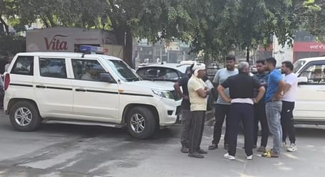 A man crossing the road after parking his vehicle was hit by a car and died.