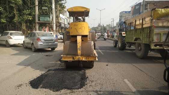 Road potholes being filled before CM's arrival