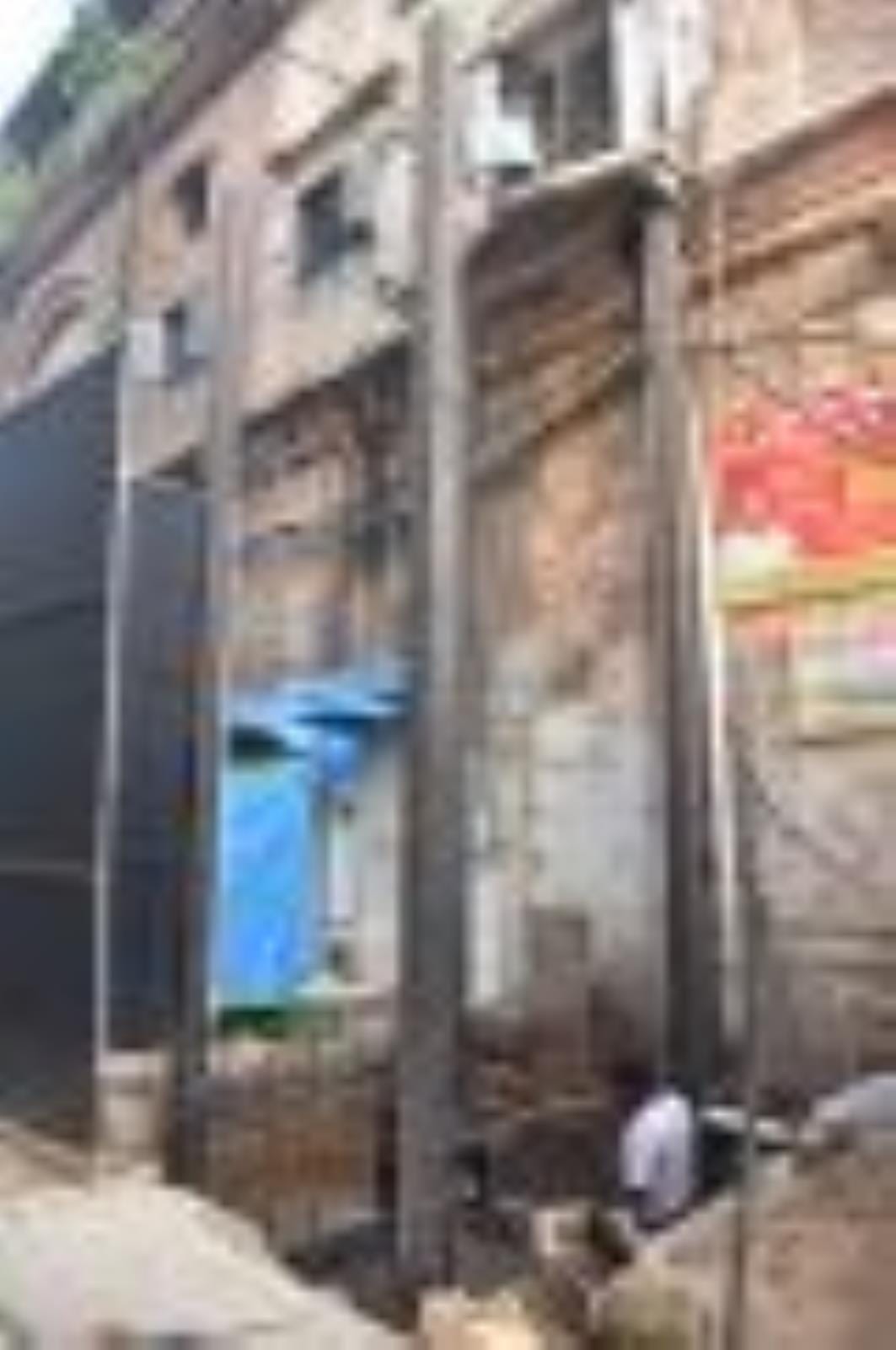 Bulldozer running on lift being installed on road