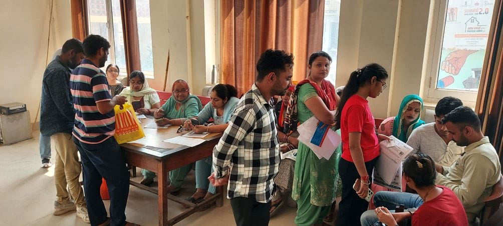 Women arrived to register for the Lado Laxmi scheme.
