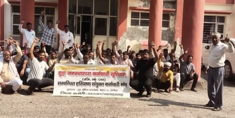 The employees staged a sit-in protest and raised slogans regarding their demands.