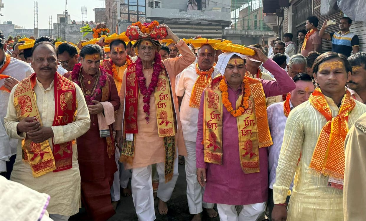 Cabinet ministers walked with the Bhagwat Geeta on their heads.