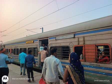 Unable to find seats in trains, forced to travel sitting on the floor
