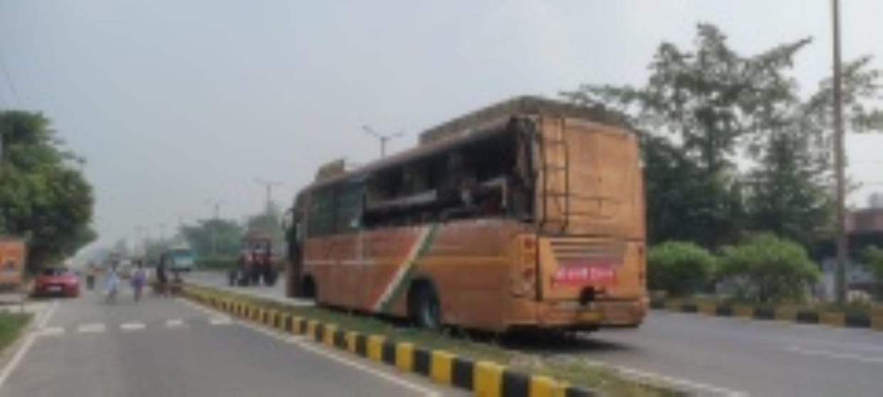 Bus collides with truck parked on highway, four seriously injured