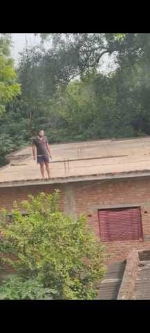 The accused who opened fire when the sewage water started flowing from the drain was arrested with a weapon.