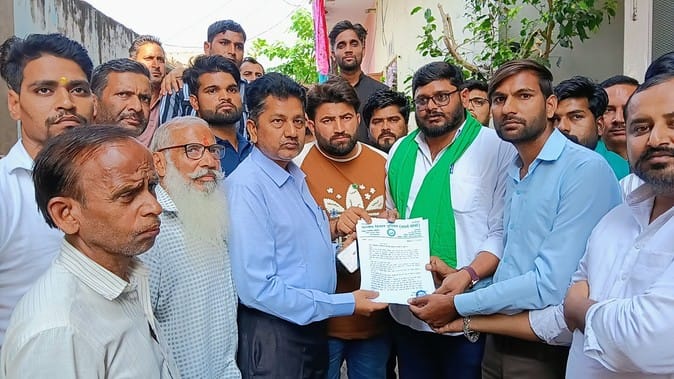 The district president was not allowed to participate in the Delhi Parliament foot march.